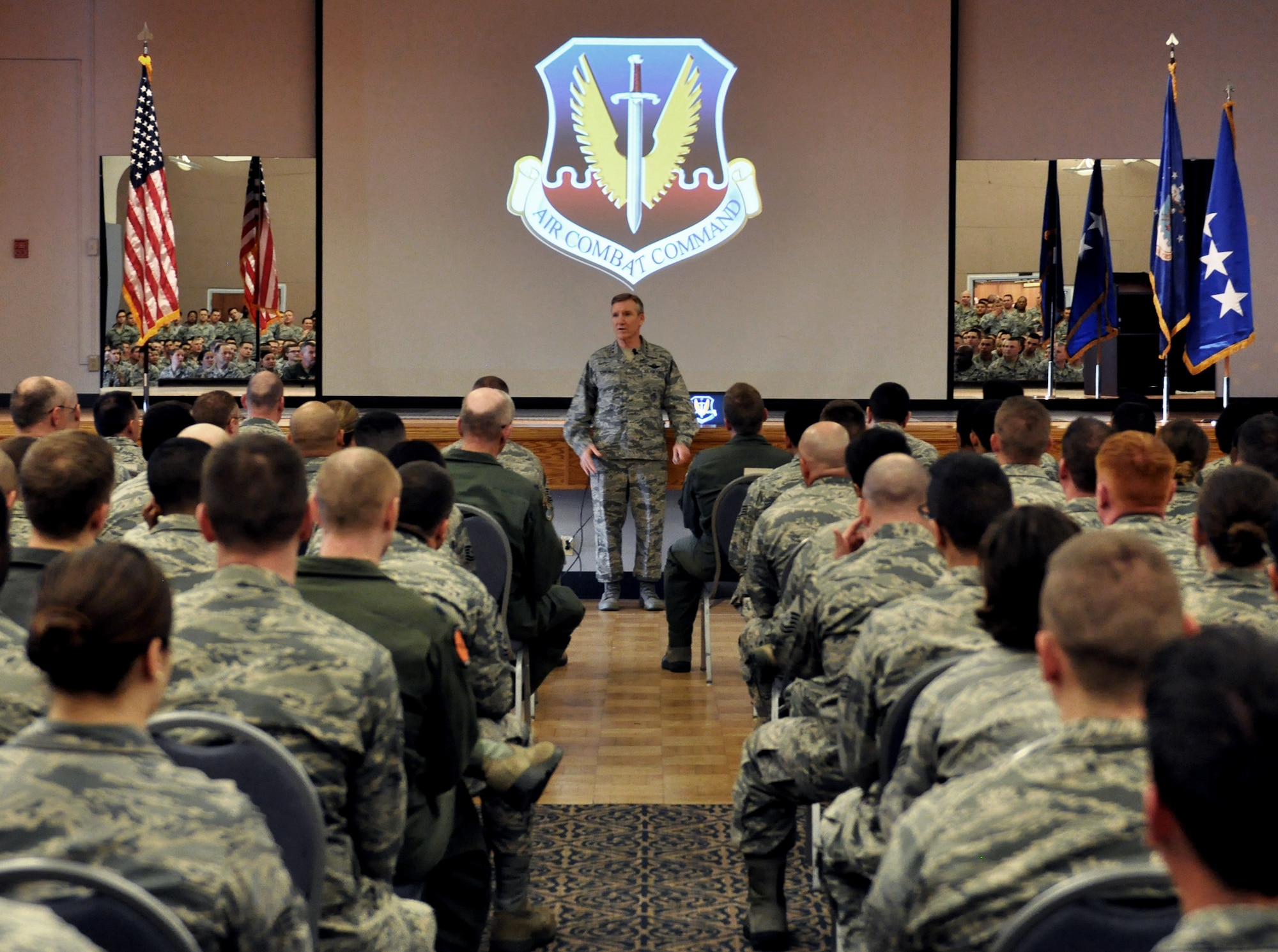 Gen. Hawk Carlisle, commander of Air Combat Command, briefs members of Team Beale Feb. 9, 2016, during his visit to Beale Air Force Base, Calif. At the all-call, Carlisle recapped the findings of the Culture and Process Improvement Program, an initiative which studied challenges within the remotely piloted aircraft and Distributed Common Ground System enterprise. (U.S. Air Force photo by Staff Sgt. Jeffrey Schultze)