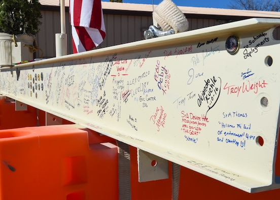 The last beam waits to be placed on the new Holloman Medical Facility after being signed by members of Team Holloman on Feb. 10. The Beam was signed as part of a “Topping Out” ceremony. The new facility will be a major improvement to the 49th Medical Group, and is scheduled to be completed November 2017. “Due to the mission growth here at Holloman, we looked at how we could renovate the existing facility, and we found that a new facility would be more ideal and energy efficient,” said Maurice Lopez, the healthcare facility manager here. “We're looking at the ease of operation not only for staff, but for patients too.” (U.S. Air Force photo by Senior Airman Leah Ferrante) 
