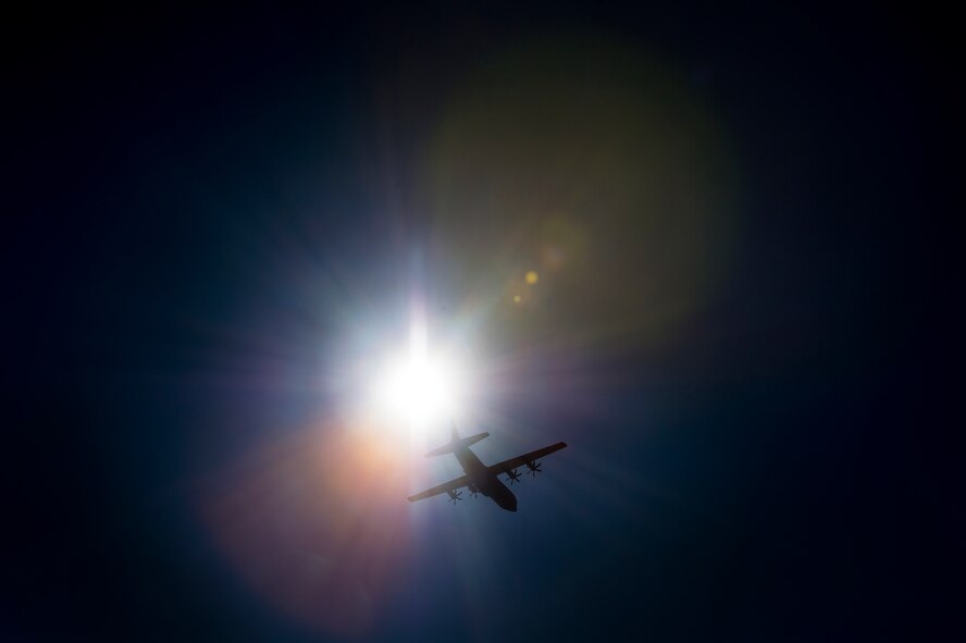 A C-130J Super Hercules aircraft from  Little Rock Air Force Base, Ark., fly over Normandy drop zone during Large Package Week at Pope Army Airfield, N.C., Feb. 5, 2016. Large Package Week leads up to Joint Operational Access Exercise 16-5, where in Army and Air Force units work together to improve interoperability for worldwide crisis, contingency and humanitarian operations. (U.S. Air Force photo by Staff Sgt. Marianique Santos)