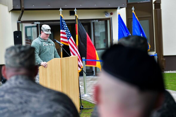 Lt. Col. Charles Hemphill, U.S. Army Corps of Engineers Europe District deputy commander, speaks during a ribbon-cutting ceremony for dorm 2818 at Kapaun Air Station, Germany, Feb. 5, 2016. The new dorm will be used to house Airmen from the 569th United States Forces Police Squadron. (U.S. Air Force photo/Staff Sgt. Sara Keller)
