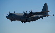 An EC-130H Compass Call from Davis-Monthan AFB, Ariz. flies over Nellis AFB, Nev. during Red Flag 16-1, Jan. 28, 2016. By gathering a multitude of diverse units together, the exercise facilitates readiness training on a higher level. (U.S. Air Force photo by Senior Airman Alex Fox Echols III/Released)  