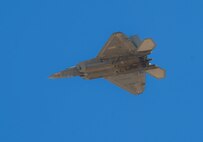 An F-22 Raptor from Tyndall AFB, Fla., flies over Nellis AFB, Nev., Jan. 28, 2016. Twelve Tyndall F-22’s are participating in Red Flag 16-1, a joint-training, full-spectrum readiness exercise designed to provide the most realistic combat training possible. (U.S. Air Force photo by Senior Airman Alex Fox Echols III)  