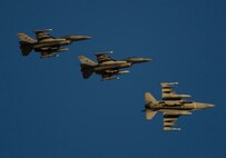 Three F-16CM from the Tucson Air National Guard Base, Ariz., fly over Nellis AFB, Nev. during Red Flag 16-1, Jan. 28, 2016. More than 130 aircraft and 3,000 personnel from more than 30 units including squadrons from Australia and the United Kingdom are participating in the most realistic combat training available. (U.S. Air Force photo by Senior Airman Alex Fox Echols III/Released)  