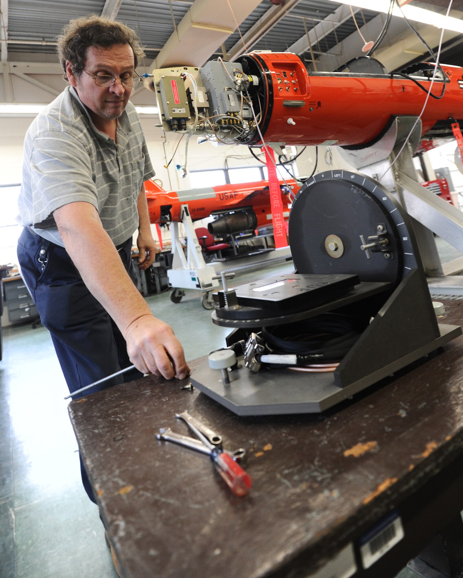Tim Clayton, 82nd Aerial Targets Squadron electronics technician, prepares to install computer components onto a BQM-167 subscale drone Feb. 4 at the subscale operations facility at Tyndall. The BQM-167 is a remotely-controlled subscale aerial target used to provide a threat-representative target drone to support the Air-to-Air Weapon System Evaluation Program and other Air Force and Department of Defense air-to-air test and evaluation programs. (U.S. Air Force photo by Senior Airman Ty-Rico Lea)