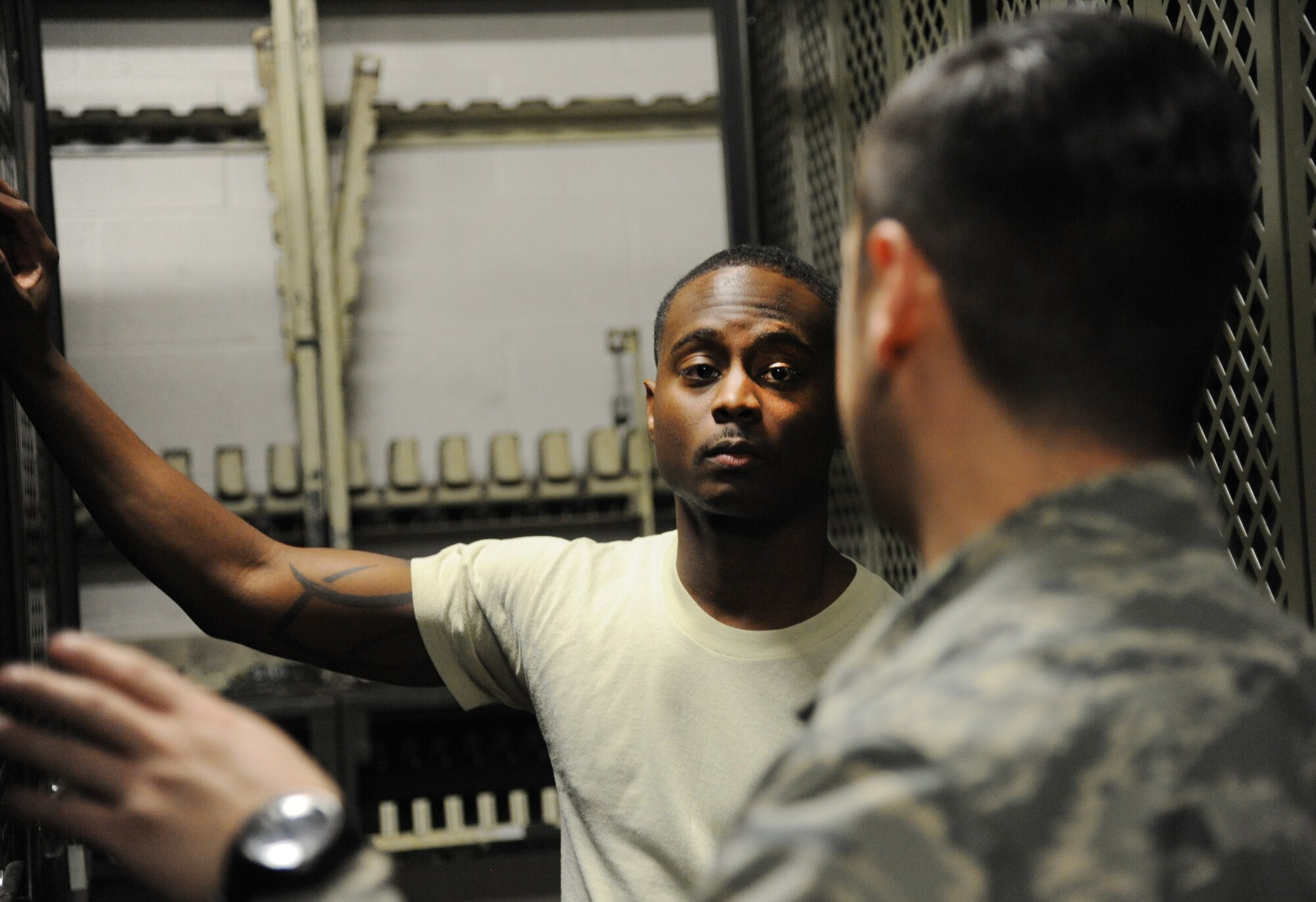 U.S. Air Force Senior Airman Charles B. Woodard IV, left, a 509th Logistics Readiness Squadron (LRS) individual protective equipment (IPE) journeyman, discusses the armory’s new layout plan with Tech. Sgt. Michael Carbajal, the 509th LRS NCO in charge of IPE, at Whiteman Air Force Base, Mo., Feb. 3, 2016. The IPE section houses weapons for the 509th Bomb Wing (BW), 131st BW and 442d Fighter Wing and is responsible for all equipment inventory, issuing and returns for deployments and training. (U.S. Air Force photo by Airman 1st Class Michaela R. Slanchik)