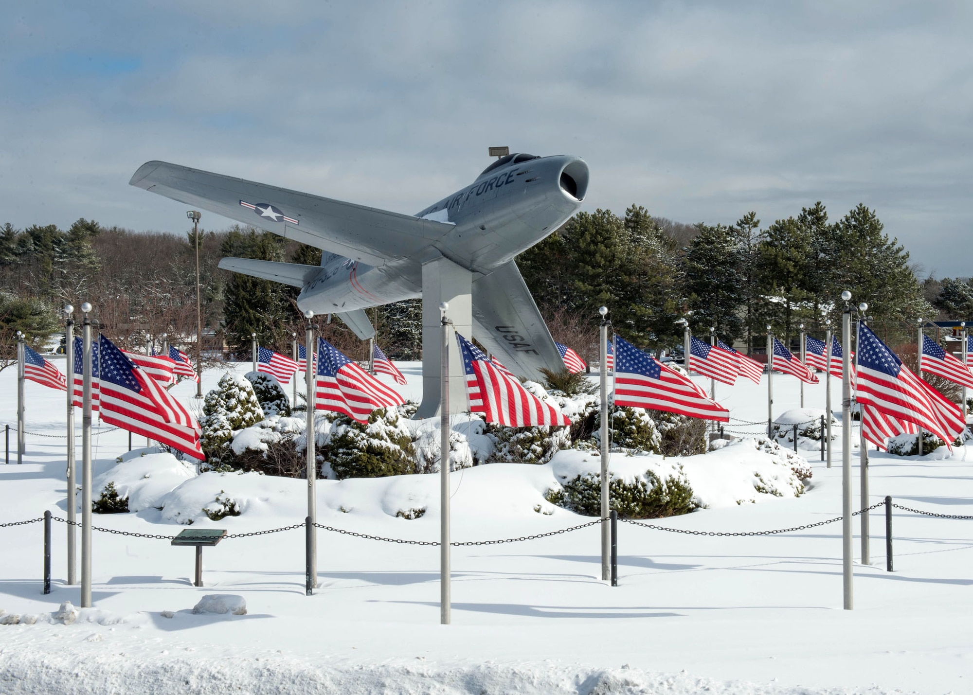 Snow accumulates around the F-86 Sabre static display on base following a winter storm to hit the region Feb. 8. The base and surrounding communities saw more than 10 inches of snow during the past week from two winter storms. (US Air Force Photo by Jerry Saslav)    
 