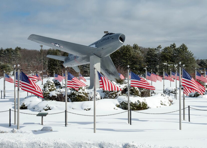 Snow accumulates around the F-86 Sabre static display on base following a winter storm to hit the region Feb. 8. The base and surrounding communities saw more than 10 inches of snow during the past week from two winter storms. (US Air Force Photo by Jerry Saslav)    
 