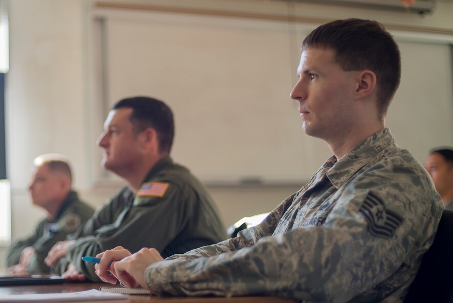 Tech. Sgt. Eric Smith, 374th Airlift Wing Safety Office weapons safety manager, attends a risk management application and integration course at Yokota Air Base, Japan, Feb. 2, 2016. The course taught flightline safety to identify potential risks and how to mitigate them, which will ensure the safety of aircraft and their crew. (U.S. Air Force photo by Senior Airman David C. Danford/Released)