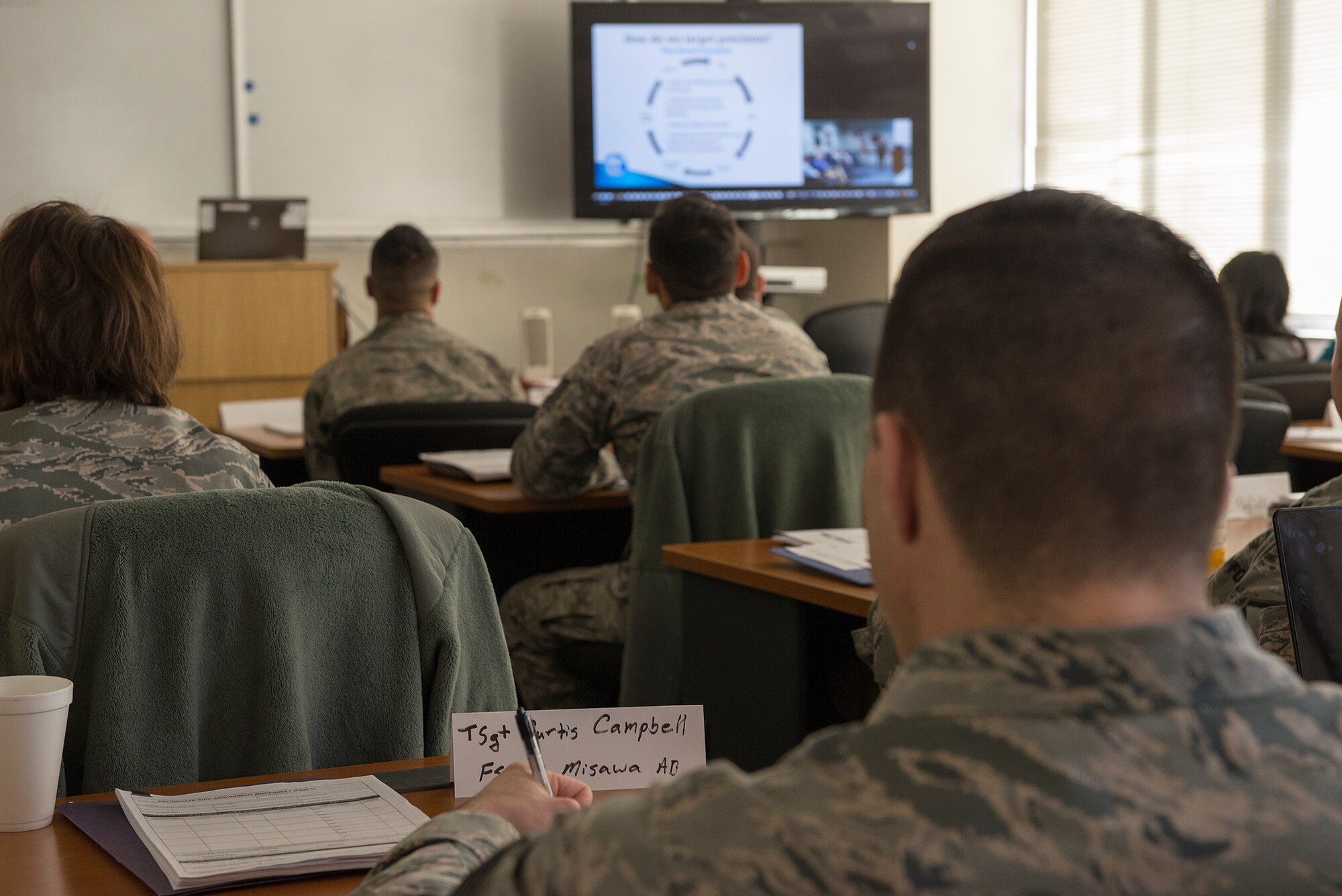 Airmen and Department of Defense civilians from across the Pacific Air Forces attend a risk management application and integration course at Yokota Air Base, Japan, Feb. 2, 2016. The course taught flightline safety to identify potential risks and how to mitigate them, which ensures the safety of aircraft and their crew. (U.S. Air Force photo by Senior Airman David C. Danford/Released)