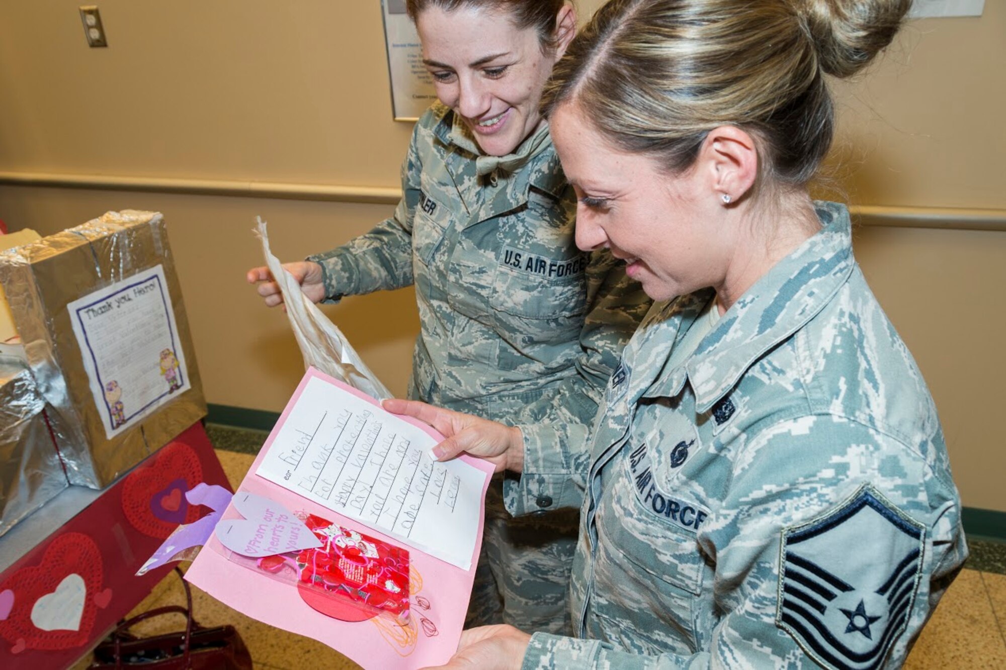 Airmen from the 107th Airlift Wing, Niagara Falls Air Reserve Station, N.Y., read through Valentine’s Day cards that were presented to them here, Feb. 10, 2016. Lynne Dixon, an Erie County legislator, presented the cards on behalf of children from more than 35 Erie County schools as part of a program that is in its seventh year. (U.S. Air National Guard photo by Senior Master Sgt. Raymond Lloyd/Released)