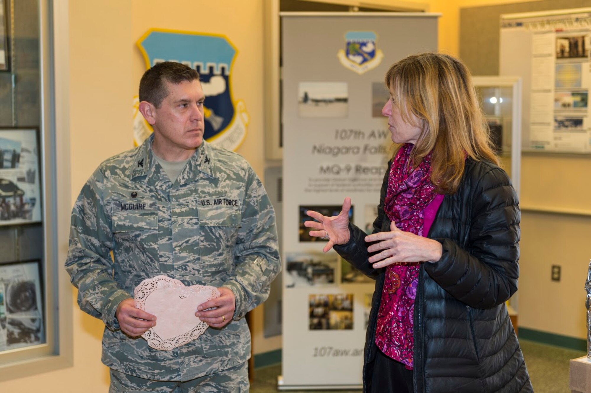 Lynne Dixon, an Erie County legislator, talks to the Airmen of the 107th Airlift Wing, Niagara Falls Air Reserve Station, N.Y., after delivering handmade Valentine’s Day cards here, Feb. 10, 2016. The cards were made by children from more than 35 Erie County schools. (U.S. Air National Guard photo by Staff Sgt. Ryan Campbell/Released)