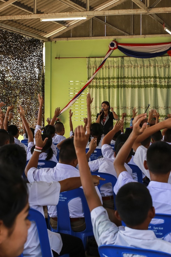 Nittaya Kaosaard, a math teacher at Ban Phromnimit School, speaks with her students in Wang Yeng Nam, Thailand, during exercise Cobra Gold, Feb. 5, 2016. Cobra Gold 2016, in its 35th iteration includes a specific focus on Humanitarian Civic Action, community engagement, and medical activities conducted during the exercise to support the needs and humanitarian interests of civilian populations around the region. 