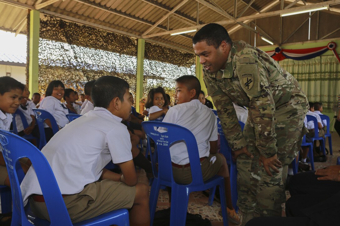 U.S. Army Maj. Kincy Clark, deputy commander, Combined Joint Civil-Military Operations Task Force (CJCMOTF), speaks with the students at Ban Phromnimit School in Wang Yeng Nam, Thailand, during exercise Cobra Gold, Feb. 5, 2016. Cobra Gold 2016, in its 35th iteration includes a specific focus on Humanitarian Civic Action, community engagement, and medical activities conducted during the exercise to support the needs and humanitarian interests of civilian populations around the region. 