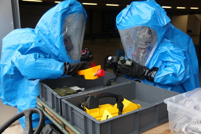 Members of the 773rd Civil Support Team gather their equipment in preparation for a chemical detection mission during exercise Ocean Response 2016 Feb. 11, 2016 at Rhine Ordnance Barracks in Germany. The 773rd trained along with members of the Spanish Unidad Militar de Emergencias and the Slovenian army during the exercise. (Photo by Lt. Col. Jefferson Wolfe, 7th Mission Support Command public affairs office)