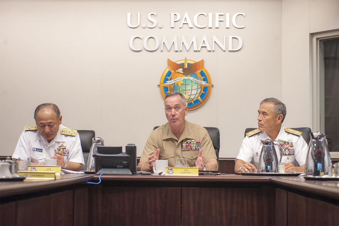 Marine Corps Gen. Joseph F. Dunford Jr., chairman of the Joint Chiefs of Staff, speaks during a trilateral meeting with Japanese Adm. Katsutoshi Kawano, left, chief of the joint staff for Japan Self-Defense Forces; U.S. Navy Adm. Harry B. Harris Jr., right, commander of U.S. Pacific Command; and South Korean Army Gen. Lee Sun-jin, not shown, chairman of the South Korean joint chiefs of staff, in Hawaii, Feb. 10, 2016. DoD photo by Navy Petty Officer 2nd Class Dominique A. Pineiro