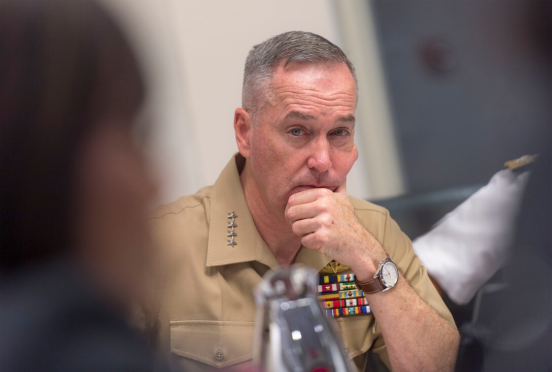 Marine Corps Gen. Joseph F. Dunford Jr., chairman of the Joint Chiefs of Staff, listens to an interpreter during a trilateral meeting with military leaders from the South Korea and Japan in Hawaii, Feb. 10, 2016. The session featured discussions on information sharing and collaboration in light of the increasing North Korean nuclear and missile threats. DoD photo by Navy Petty Officer 2nd Class Dominique A. Pineiro