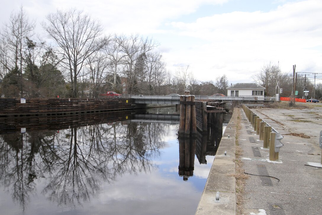 Motorists travel over the Deep Creek Bridge in Chesapeake, Virginia, which spans the Dismal Swamp Canal on February 9, 2016.  $22 million in federal money is identified in the USACE work plan and president's FY 17 budget to go towards replacing the 80 year-old draw bridge. (U.S. Army photo/Patrick Bloodgood)