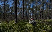 Sgt. 1st Class Seth Eaton, U.S. Army Reserve military police Soldier with the 300th MP Brigade, of Stow, Ohio, takes on a land navigation course in this year's 200th Military Police Command's Best Warrior Competition held at Camp Blanding, Fla., Feb. 9. The winning noncommissioned officer and junior enlisted Soldiers will move on to the U.S. Army Reserve Command competition in May. (U.S. Army photo by Master Sgt. Michel Sauret)
