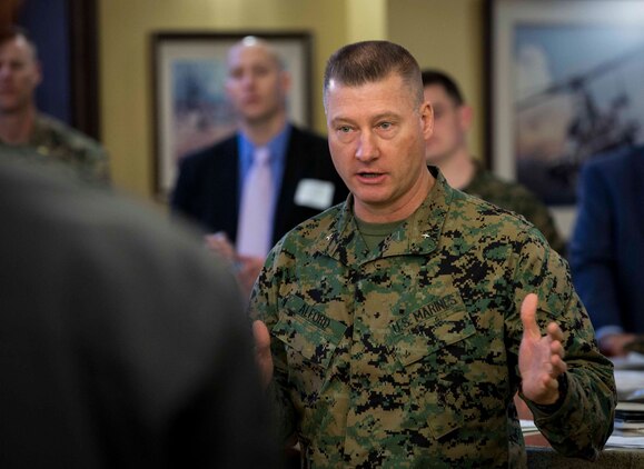 Brig. Gen. J.D. Alford, commanding general, Marine Corps Warfighting Laboratory/Futures Directorate, talks with Science Fiction Writer's Workshop participants Feb. 4.