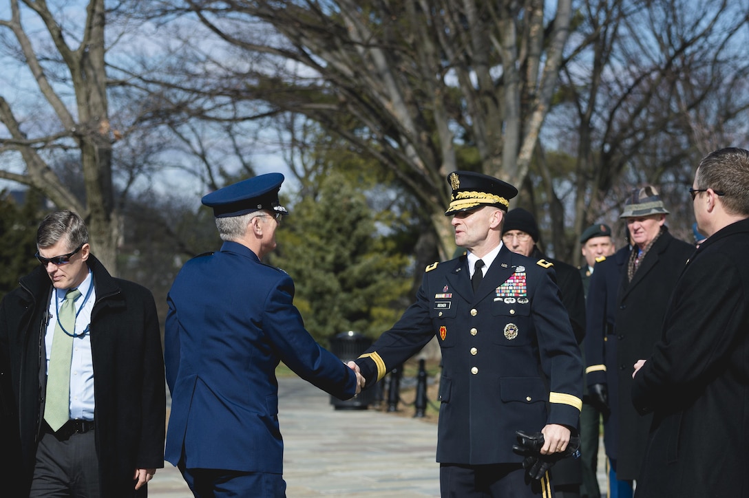 Army Maj. Gen. Bradley A. Becker, right, commanding general of Joint Force Headquarters National Capitol Region and the U.S. Army Military District of Washington, shakes hands with Air Force Gen. Paul J. Selva, vice chairman of the Joint Chiefs of Staff, at Arlington National Cemetery in Arlington, Va., Feb. 10, 2016. Selva and Becker met to welcome Canadian Governor General David Johnston, who visited the cemetery to honor U.S. and Canadian service members. DoD photo by Army Staff Sgt. Sean K. Harp