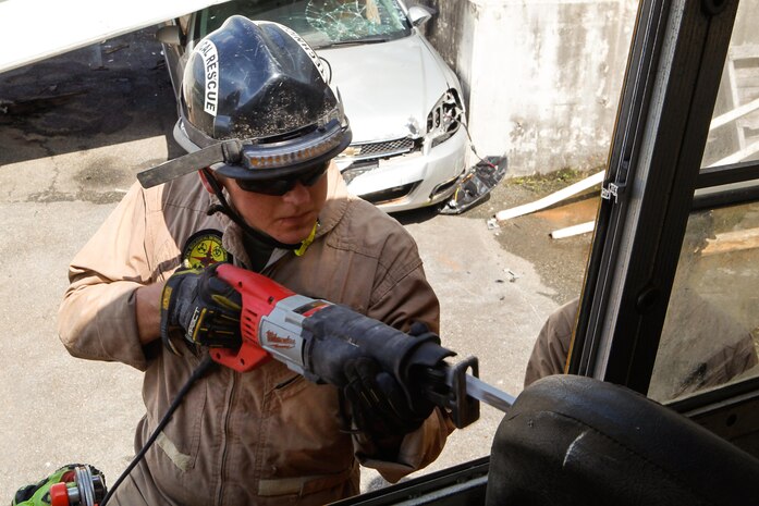 Marines and Sailors with Chemical Biological Incident Response Force (CBIRF), U.S. Marine Corps Forces Command (MARFORCOM), take part in exercise Scarlet Response 2015 at the Guardian Centers in Perry, Ga., July 21 – 24, 2015. The exercise tested all the specific skills the unit possesses to respond to an incident of chemical, biological, radiological, nuclear or high-yield explosive (CBRNE) event. (U.S. Marine Corps photo by Sgt. Jonathan Herrera/Released) 