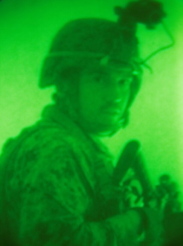 MARINE CORPS BASE CAMP PENDLETON, Calif. – Lance Cpl. Jeremiah W. Johnson, a rifleman with Golf Company, 2nd Battalion, 4th Marines, 1st Marine Division, conducts a night raid with his fellow Marines at a mock combat town at Camp Pendleton Feb. 4, 2016. Marines from Golf Co. conducted follow-on exercises with Expeditionary Operations Training Group in preparation for the upcoming deployment with the 31st Marine Expeditionary Unit. (U.S. Marine Corps Photo by Lance Cpl. Justin E. Bowles)