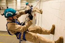 Marines and Sailors with Chemical Biological Incident Response Force (CBIRF), U.S. Marine Corps Forces Command (MARFORCOM), take part in exercise Scarlet Response 2015 at the Guardian Centers in Perry, Ga., July 21 – 24, 2015. The exercise tested all the specific skills the unit possesses to respond to an incident of chemical, biological, radiological, nuclear or high-yield explosive (CBRNE) event. (U.S. Marine Corps photo by Sgt. Jonathan Herrera/Released)