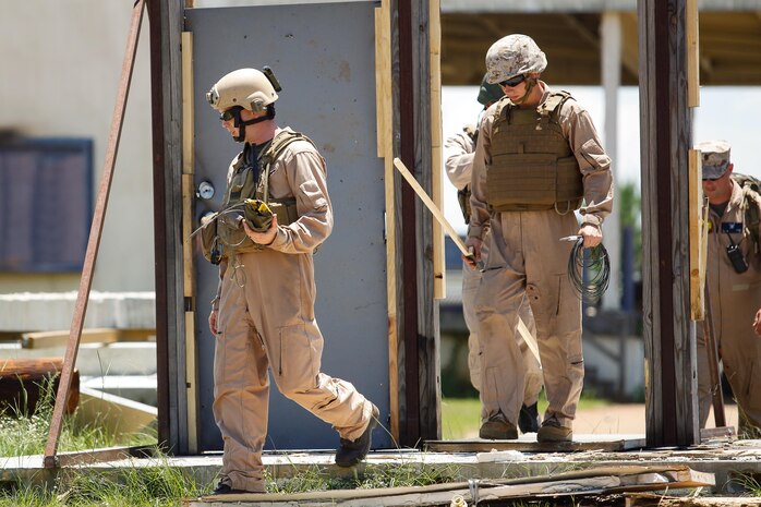 Marines and Sailors with Chemical Biological Incident Response Force (CBIRF), U.S. Marine Corps Forces Command (MARFORCOM), take part in exercise Scarlet Response 2015 at the Guardian Centers in Perry, Ga., July 21 – 24, 2015. The exercise tested all the specific skills the unit possesses to respond to an incident of chemical, biological, radiological, nuclear or high-yield explosive (CBRNE) event. (U.S. Marine Corps photo by Sgt. Jonathan Herrera/Released)