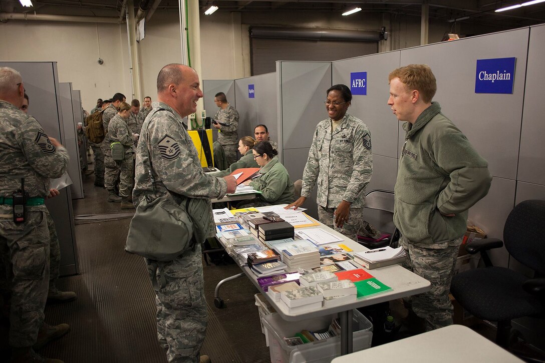 Air Force Reservists participate in Operation CRISIS LOOK 16-01 Feb. 6, 2016 at Travis Air Force Base, Calif. Conducted by the Inspector General Director of Inspection offices of the 349th and 60th Air Mobility Wings, the event practiced and validated the Total Force team's ability to rapidly deploy qualified members for worldwide duty.