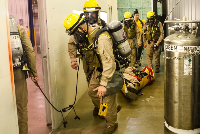 Marines and Sailors with Chemical Biological Incident Response Force (CBIRF), U.S. Marine Corps Forces Command (MARFORCOM), take part in exercise Scarlet Response 2015 at the Guardian Centers in Perry, Ga., July 21 – 24, 2015. The exercise tested all the specific skills the unit possesses to respond to an incident of chemical, biological, radiological, nuclear or high-yield explosive (CBRNE) event. (U.S. Marine Corps photo by Sgt. Jonathan Herrera/Released)