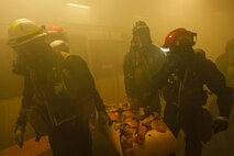 Marines and Sailors with Chemical Biological Incident Response Force (CBIRF), U.S. Marine Corps Forces Command (MARFORCOM), take part in exercise Scarlet Response 2015 at the Guardian Centers in Perry, Ga., July 21 – 24, 2015. The exercise tested all the specific skills the unit possesses to respond to an incident of chemical, biological, radiological, nuclear or high-yield explosive (CBRNE) event. (U.S. Marine Corps photo by Sgt. Jonathan Herrera/Released)