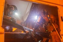 Marines and Sailors with Chemical Biological Incident Response Force (CBIRF), U.S. Marine Corps Forces Command (MARFORCOM), take part in exercise Scarlet Response 2015 at the Guardian Centers in Perry, Ga., July 21 – 24, 2015. The exercise tested all the specific skills the unit possesses to respond to an incident of chemical, biological, radiological, nuclear or high-yield explosive (CBRNE) event. (U.S. Marine Corps photo by Sgt. Jonathan Herrera/Released) 