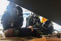 Marines and Sailors with Chemical Biological Incident Response Force (CBIRF), U.S. Marine Corps Forces Command (MARFORCOM), take part in exercise Scarlet Response 2015 at the Guardian Centers in Perry, Ga., July 21 – 24, 2015. The exercise tested all the specific skills the unit possesses to respond to an incident of chemical, biological, radiological, nuclear or high-yield explosive (CBRNE) event. (U.S. Marine Corps photo by Sgt. Jonathan Herrera/Released)