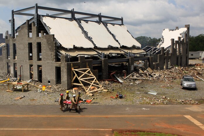Marines and Sailors with Chemical Biological Incident Response Force (CBIRF), U.S. Marine Corps Forces Command (MARFORCOM), take part in exercise Scarlet Response 2015 at the Guardian Centers in Perry, Ga., July 21 – 24, 2015. The exercise tested all the specific skills the unit possesses to respond to an incident of chemical, biological, radiological, nuclear or high-yield explosive (CBRNE) event. (U.S. Marine Corps photo by Sgt. Jonathan Herrera/Released)