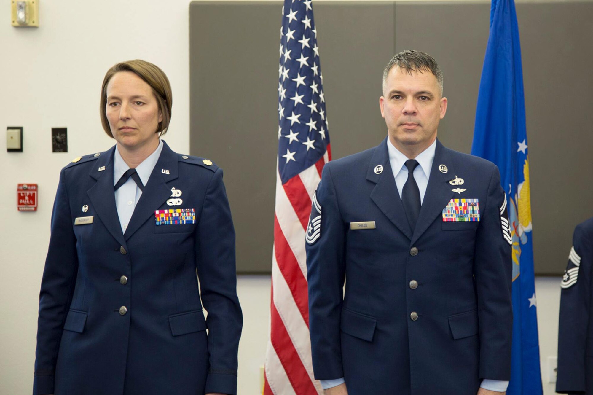 Senior Master Sergeant James Child is promoted to Chief Master Sergeant in a ceremony presided by Maj. Jolane McCarthy, Commander, 45th Aerial Port Squadron on Feb. 7, 2016 at Travis Air Force Base, Calif. Childs is the 45th APS air transportation manager and senior Air Reserve Technician. Childs has been in the Air Force Reserve for 28 years. (U.S. Air Force photo/Maj. Samuel Lee)