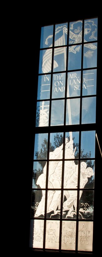 The costly island warfare of WWII is depicted in this window. The raising of the American flag on Mount Suribachi, the most dramatic and symbolic picture of any war is a reminder to everyone of the sacrifices the Navy and Marine Corps made for their country in the Pacific.
