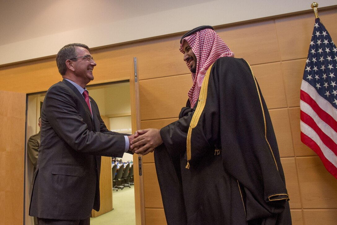 Defense Secretary Ash Carter, left, greets the Saudi Defense  Minister Mohammad bin Salman as they meet at NATO headquarters in Brussels, Feb. 11, 2016, to discuss matters of mutual importance. DoD photo by Air Force Senior Master Sgt. Adrian Cadiz