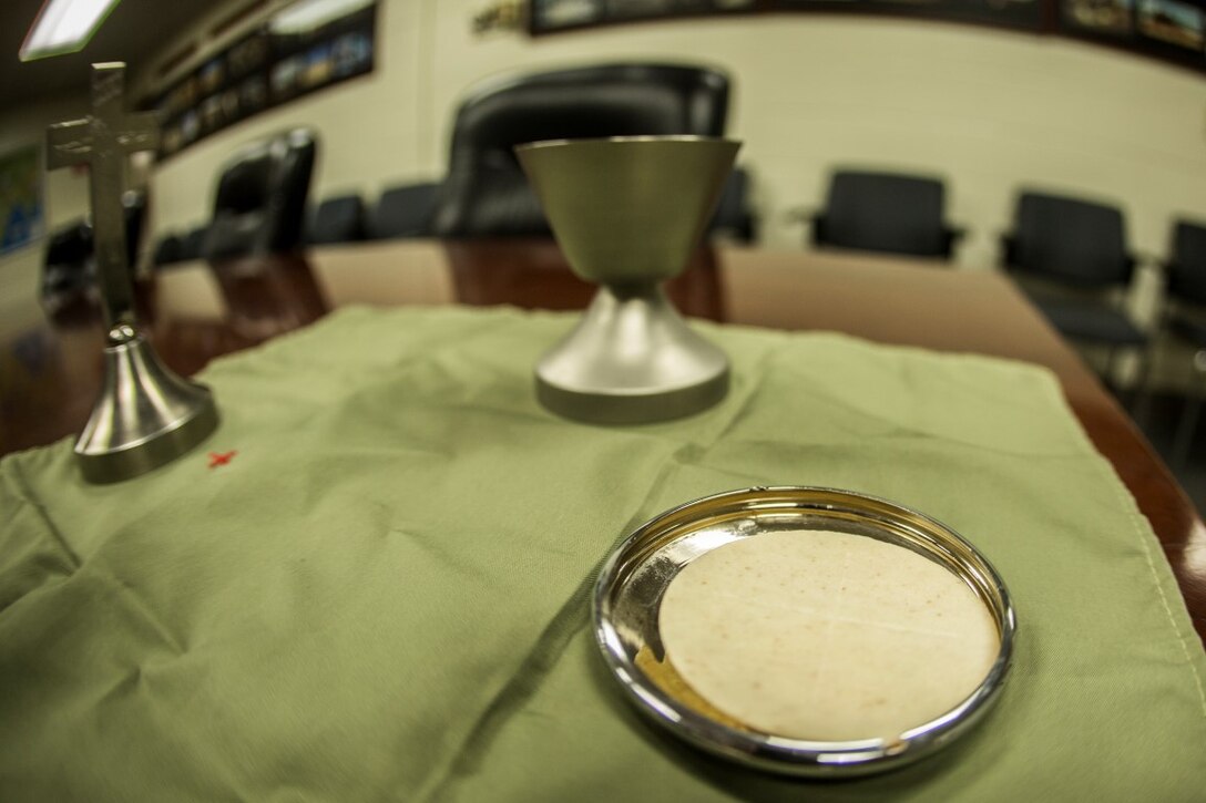 Religious offerings are displayed before the start of an Ash Wednesday service, Feb. 10, 2016. During the service, those in attendance were marked with ash on their forehead. The ash symbolizes confession, repentance and penance. The observance commences the Lenten season in the liturgical calendar. The service was given by Cmdr. James Johnson, Navy chaplain, with I Marine Headquarters Group, I Marine Expeditionary Force, and was held at Camp Pendleton. (U.S. Marine Corps photo by Sgt. Emmanuel Ramos/Released)