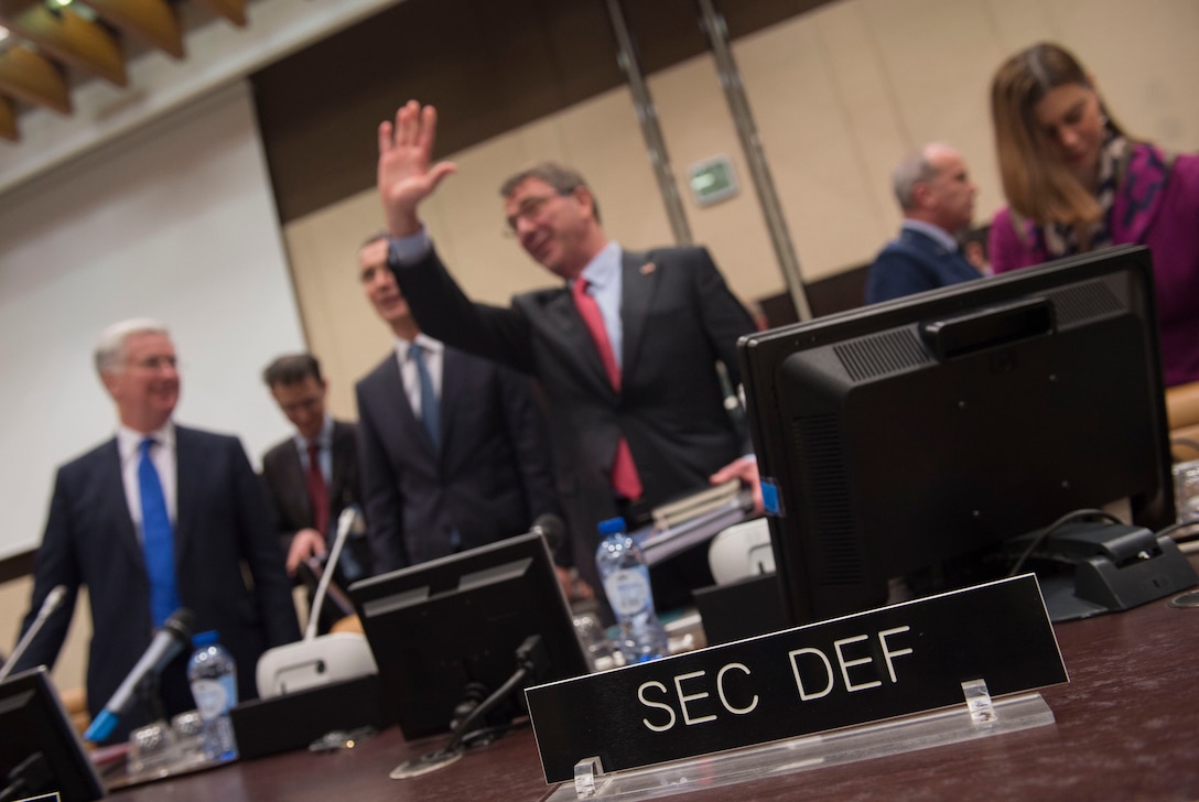 Defense Secretary Ash Carter waves hello as he arrives for a meeting at NATO headquarters in Brussels, Feb. 11, 2016, to discuss accelerating the fight against the Islamic State of Iraq and the Levant.  DoD photo by Air Force Senior Master Sgt. Adrian Cadiz