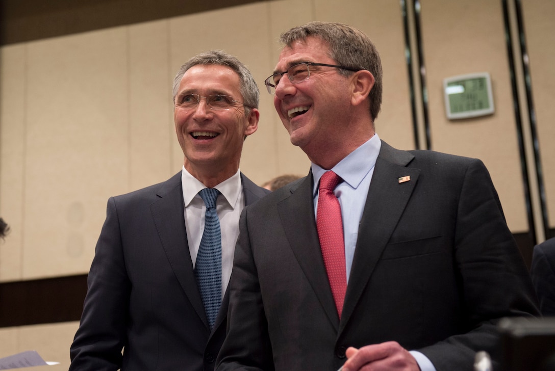 Defense Secretary Ash Carter shares a light moment with NATO Secretary General Jens Stoltenberg as Carter arrives for a meeting at NATO headquarters in Brussels. Feb. 11, 2016, to discuss accelerating the fight against the Islamic State of Iraq and the Levant. DoD photo by Air Force Senior Master Sgt. Adrian Cadiz