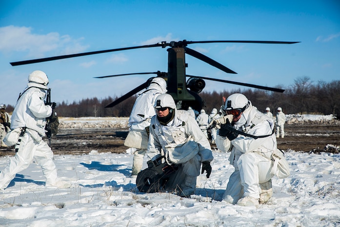 Japan Ground Self Defense Force soldiers board a CH-47 Chinook while providing security during Forest Light 16-2 in Yausubetsu Training Area, Hokkaido, Japan, Feb. 1, 2016.  The exercise strengthens military partnership, solidifies regional security agreements and improves individual and unit-level skills. The JGSDF soldiers are with the 27th Infantry Regiment, 5th Brigade, Northern Army. The Marines are with Kilo Company, 3rd Battalion, 5th Marine Regiment, currently assigned to 4th Marine Regiment, 3rd Marine Division, III Marine Expeditionary Force. 