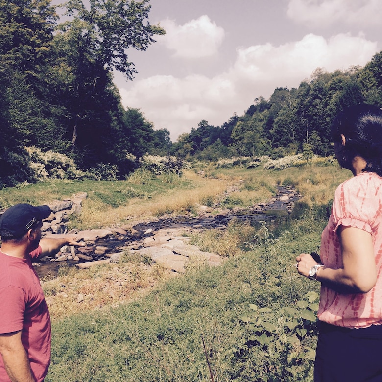 Graydon Dutcher (Left) of the Delaware County Soil and Water Conservation District showing Rifat Salim, project manager with the U.S. Army Corps of Engineers the much improved condition of Third Brook today. 