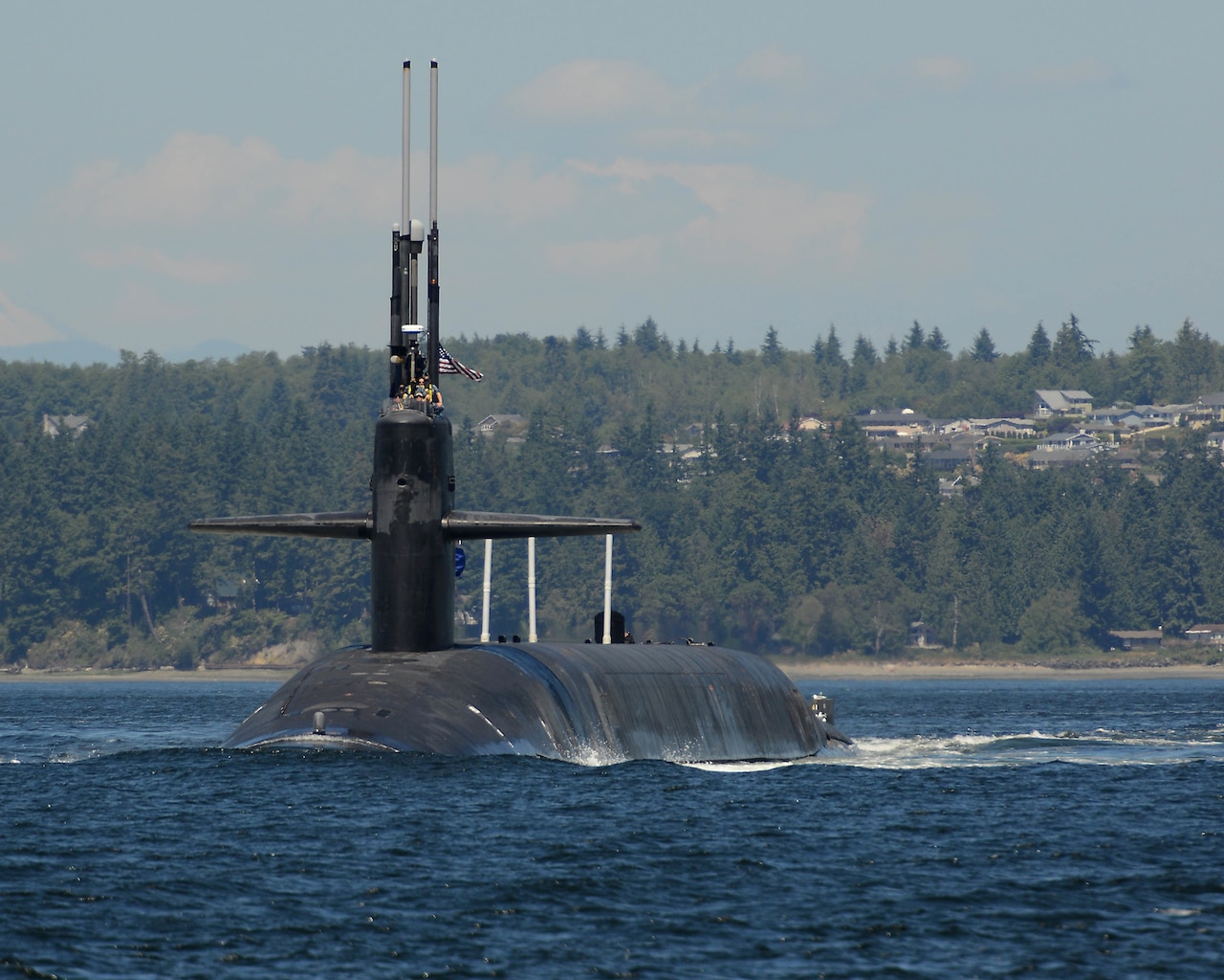 USS Maine prepares to transit the Hood Canal as it sails back to its homeport of Naval Base Kitsap - Bangor in Bangor, Wash., June 17, 2015. Maine is one of eight ballistic missile submarines stationed at the base providing the survivable leg of the strategic deterrence triad for the United States. Navy photo by Petty Officer 1st Class Kenneth G. Takada