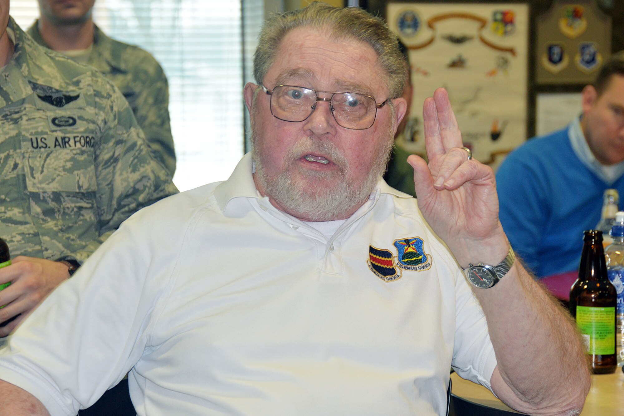 Retired U.S. Air Force Lt. Col. Max Moore, 55th Wing Association secretary, talks a little about his 20 plus year career with the 55th Wing during a heritage event at the 97th Intelligence Squadron Feb. 5. The event was the first in a series of events that will lead up to the 55th Wing Birthday Ball May 21. (U.S. Air Force photo by Kendra Williams)