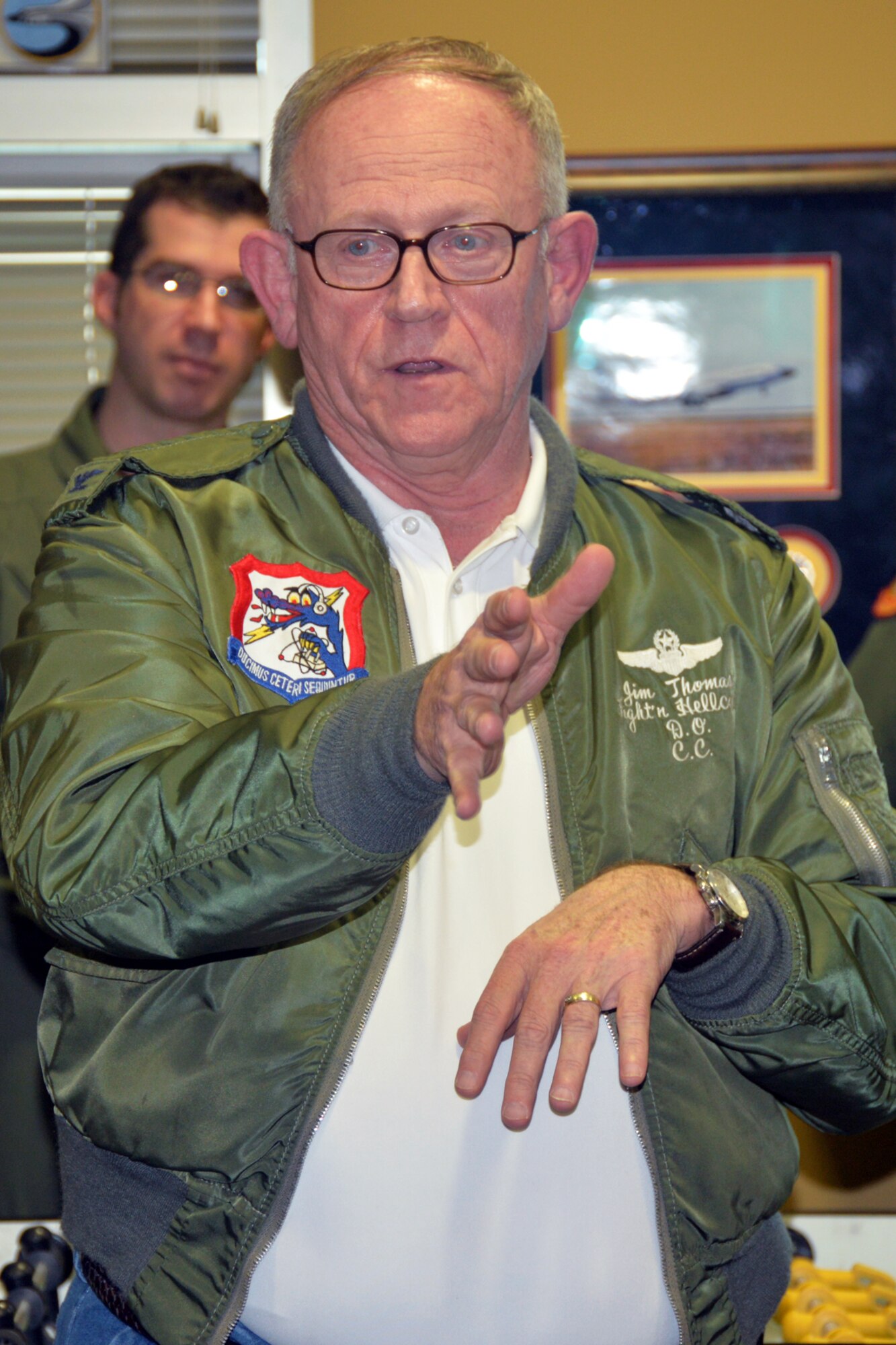 Retired U.S. Air Force Col. Jim Thomas, 55th Wing Association president, talks to Airmen about his experiences with the 55th Wing during a heritage event at the 97th Intelligence Squadron Feb. 5. The event was the first in a series of events that will lead up to the 55th Wing Birthday Ball May 21. (U.S. Air Force photo by Kendra Williams)