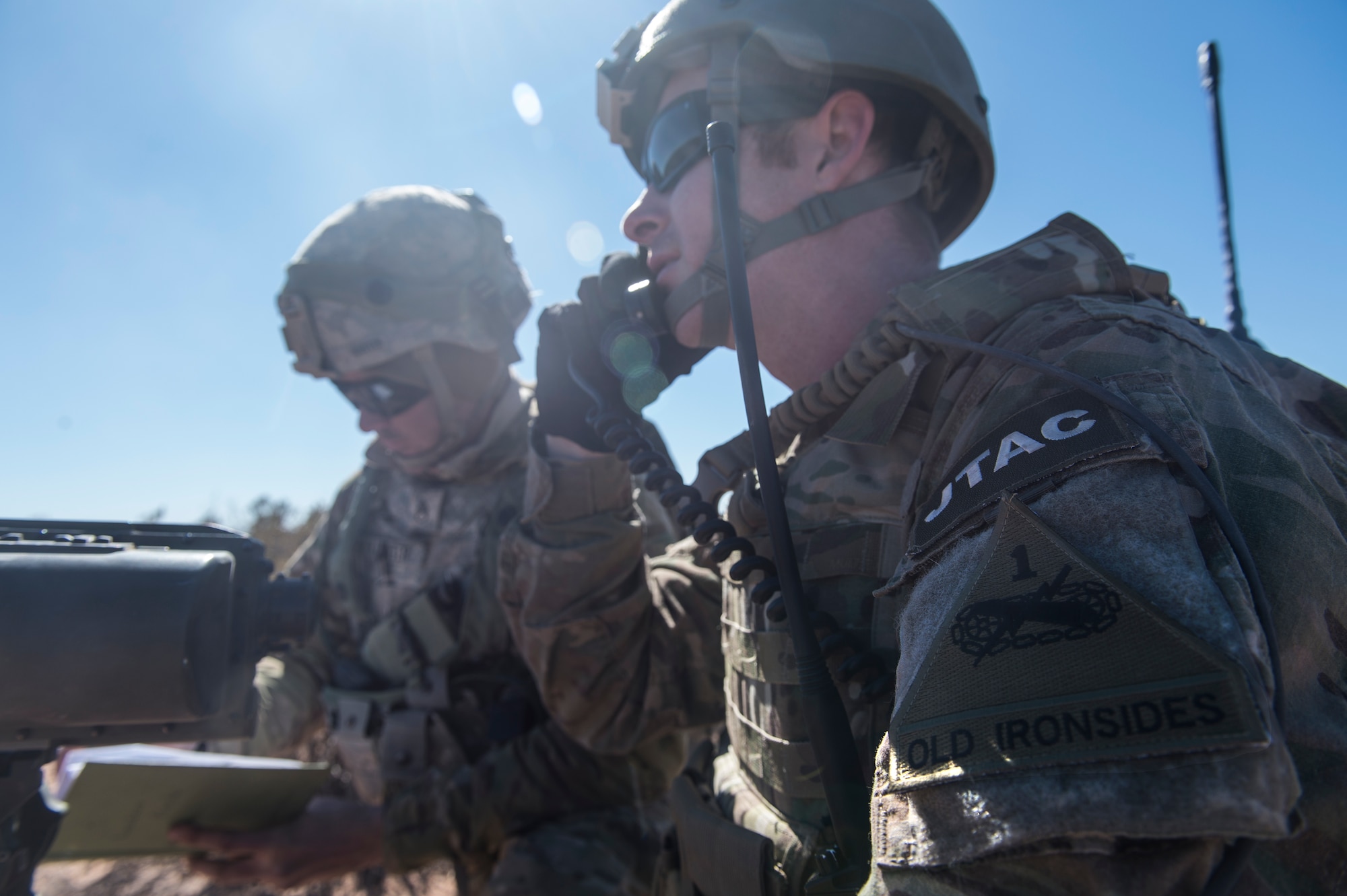 U.S. Air Force Staff Sgt. Lonny Cunningham, 7th Air Support Operations Squadron joint terminal attack controller, right, uses the Lightweight Laser Designator Rangefinder while U.S. Army Staff Sgt. Patrick Kuster, 3rd Brigade Combat Team, 1st Armored Division, write coordinates during the joint exercise, Iron Focus, Feb. 3, 2016, at Oro Grande Training Complex at Fort Bliss, Texas. The LLDR provides coordinates for both GPS-guided and ordinary munitions. (U.S. Air Force photo by Senior Airman Olivia Dominique/Released)  