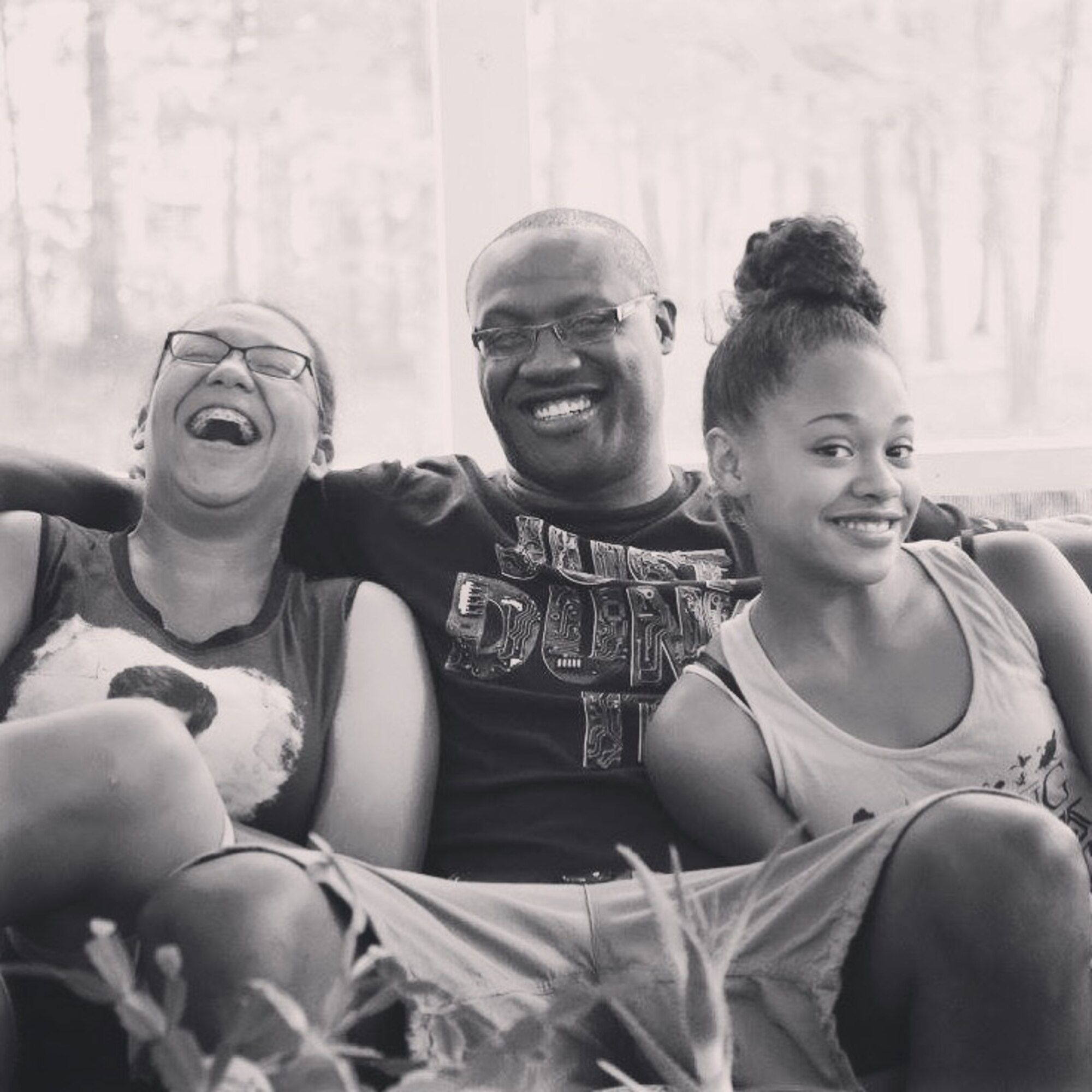 Talia Hay, left, laughs with her father Tech. Sgt. Alfonso Hay, 319th Communications Squadron NCO-in-charge of client systems technicians, and younger sister Emelia. Talia’s positive personality helped her stay resilient during an unexpected medical issue that occurred in September 2015. (Courtesy Photo)