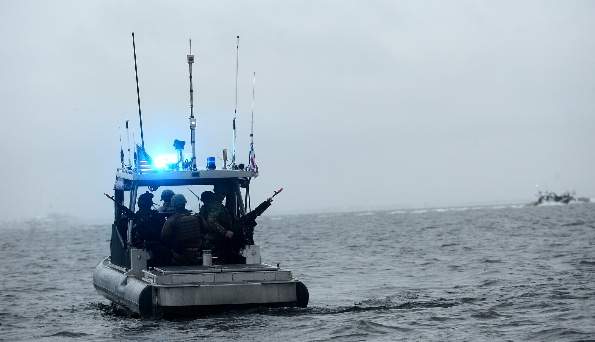 Members from U.S. Coast Guard Port Security Unit 307 complete the sea portion of a field training exercise at MacDill Air Force Base, Fla., Feb. 6, 2016. The training focused on mobilization readiness, physical movement and personnel transport. (U.S. Air Force photo by Senior Airman Tori Schultz)