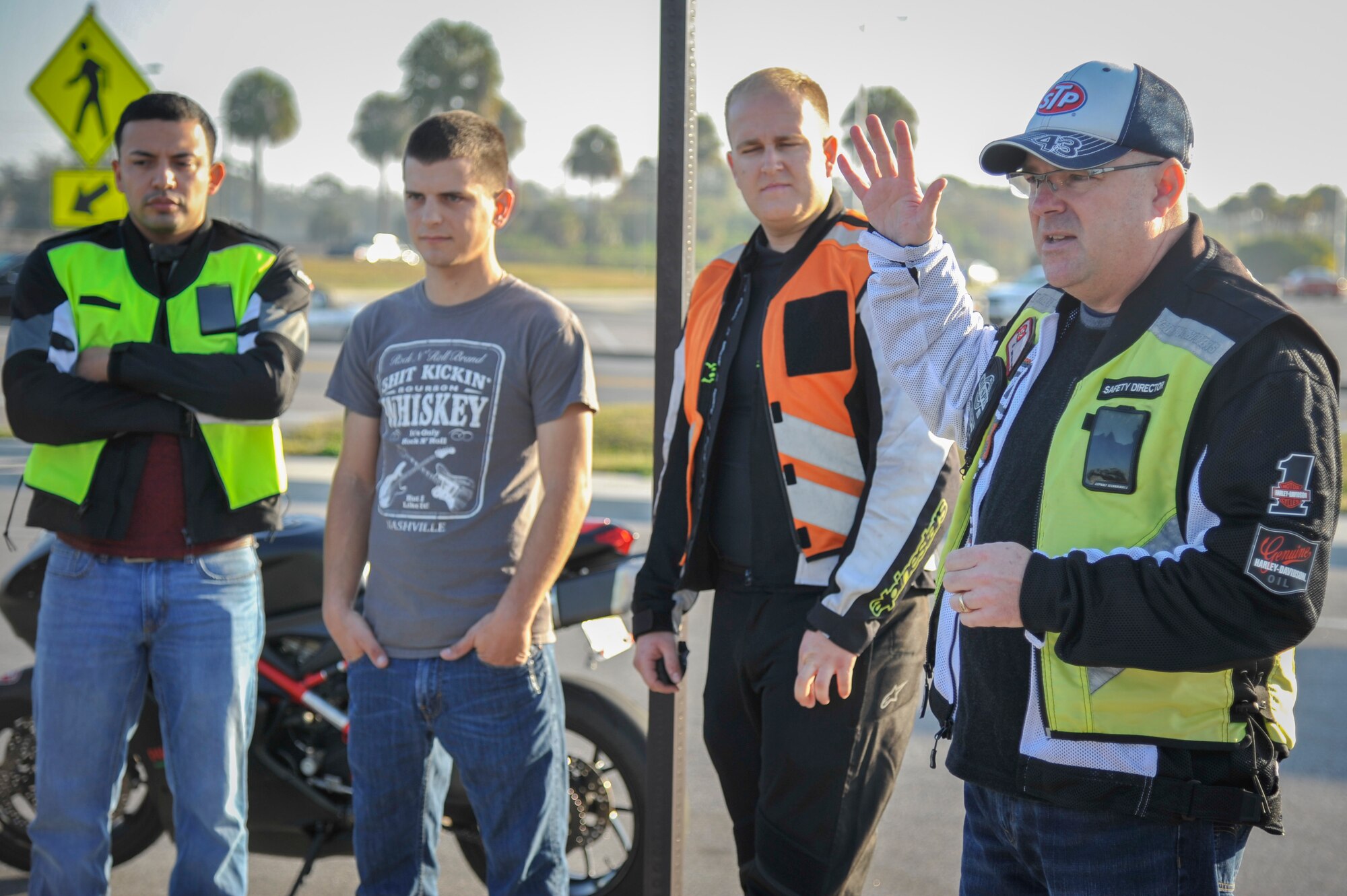Senior Master Sgt. Kelley Latham, the unit deployment manager for the 45th Aeromedical Evacuation Squadron, talks about the importance of safety and mentorship before a group of motorcyclists at MacDill Air Force Base, Fla., Feb. 2, 2016. More than 30 current and retired Service members met for the group ride. (U.S. Air Force photo by Senior Airman Ned T. Johnston)