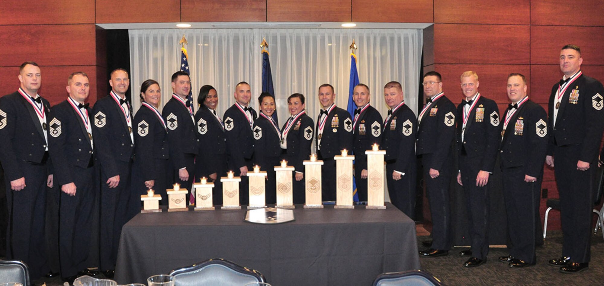 JBER recognized 16 Airmen who joined the top one percent of the enlisted tier in a ceremony that featured congratulations from their commanders, reception of a medallion
representing the moment, a candle-lighting ceremony that acknowledges each rank earned before this one, and a dinner honoring their spouse and support system who
took the journey with them. (Courtesy photo)